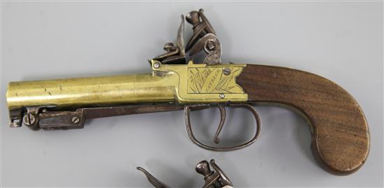 A pair of brass framed and barrelled flintlock boxlock pocket pistols, 8in. (11in with bayonet)